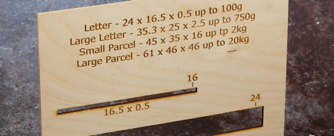 Wooden engraved PiP for Royal Mail.Engraved with the dimensions for the different sizes of Royal Mail post and cut outs to measure letter sizes.