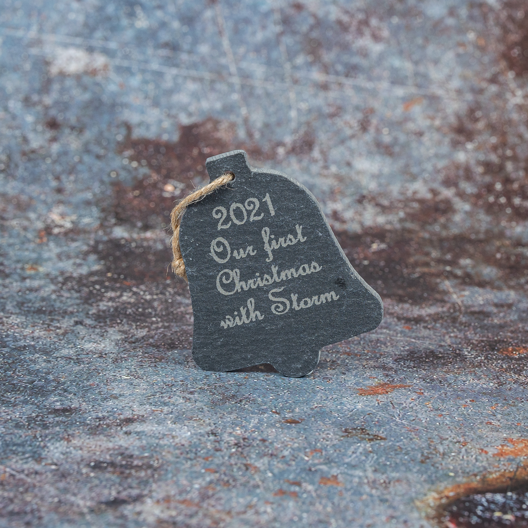 Slate tree decoration shaped like a bell and with engraved with a year and our first Christmas with Bugsy.