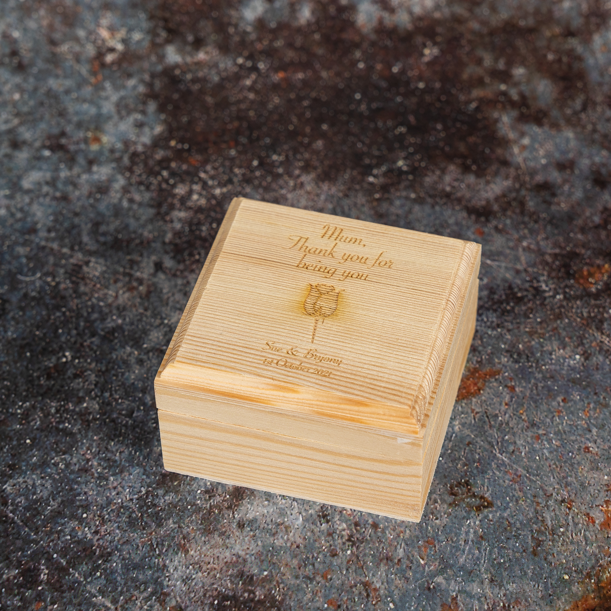 Wooden keepsake box with thank you message for mother and wedding details engraved with rose imagery.