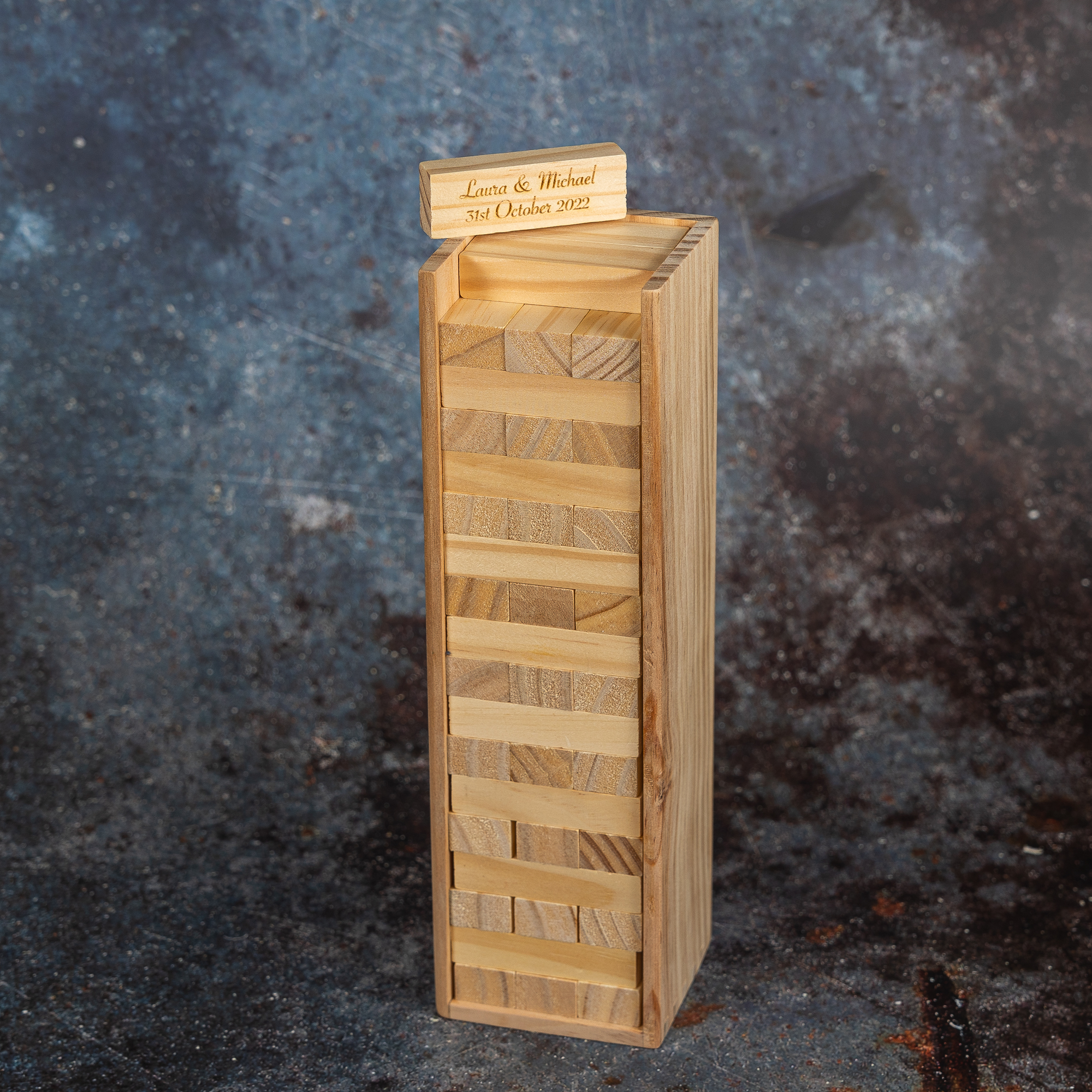 Front view of tumble tower in outer box.