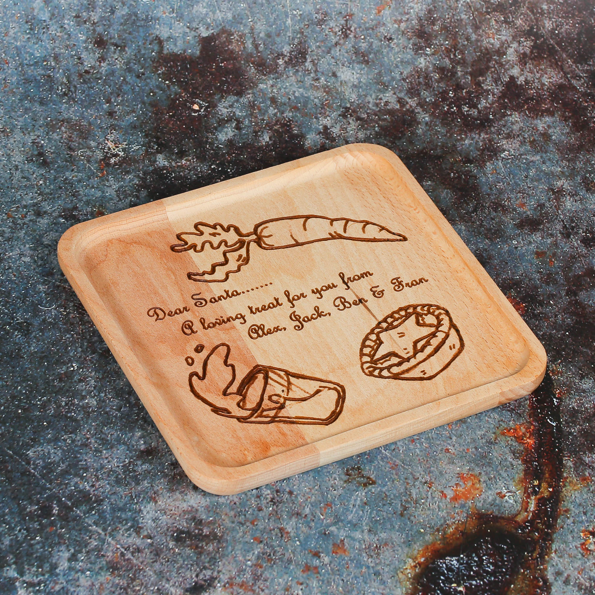 Square wooden plate with personalised engraving for Santa's treats.