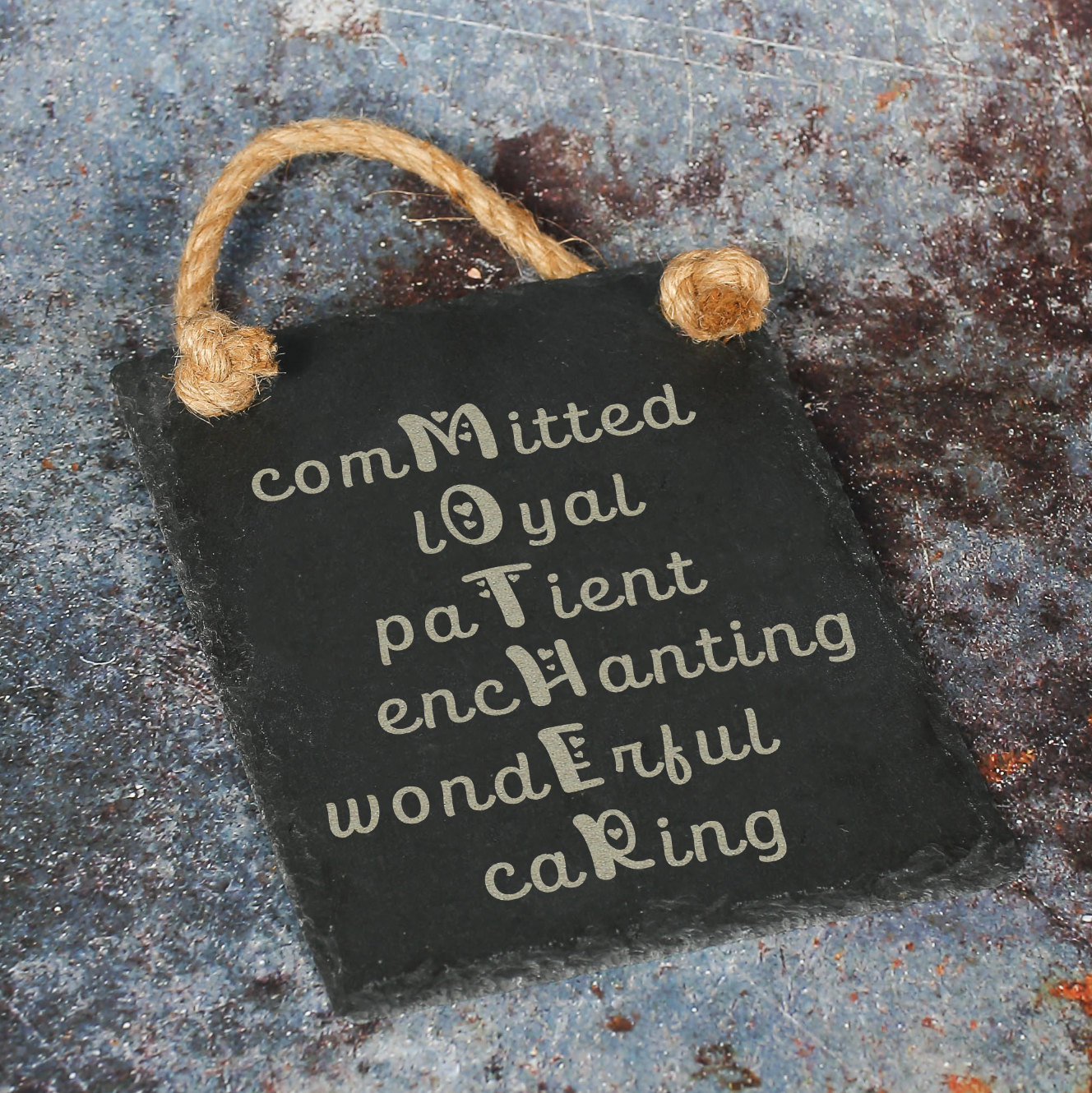 Slate engraved sign with the word Mother engraved in an acrostic fashion using the words committed, loyal, patient,enchanting, wonderful and caring.