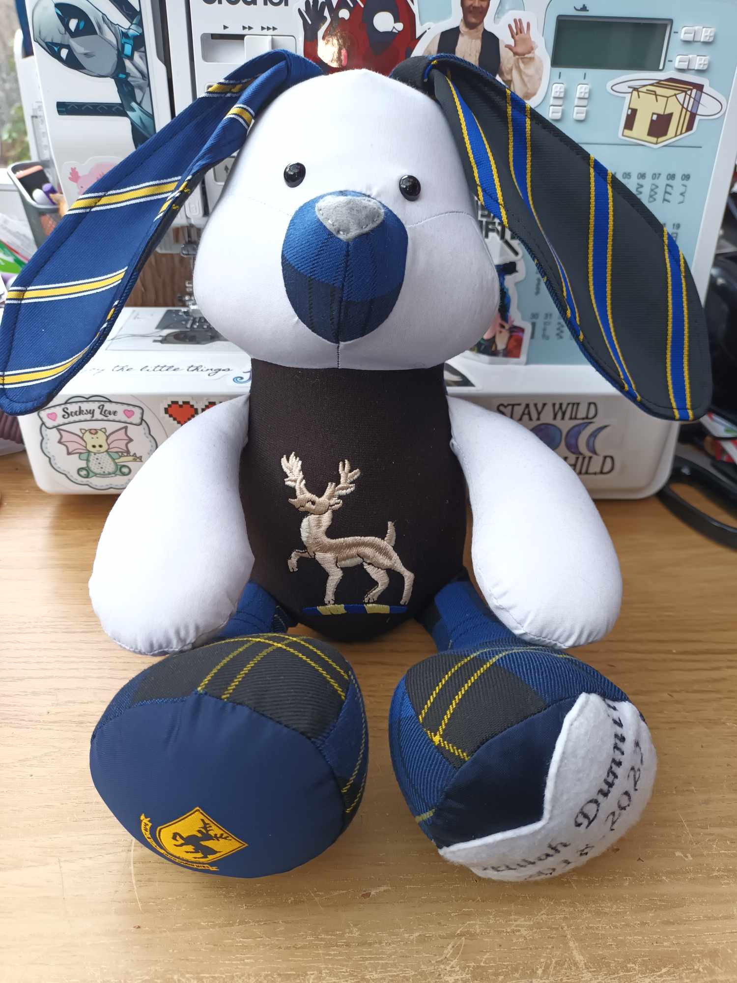 Stuffed memory rabbit created from ties, a shirt and a blazer pocket.