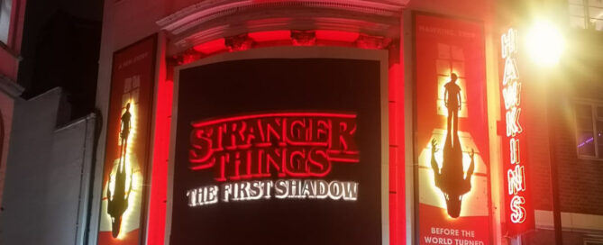 Outside of theatre showing sign for Stranger Things The First Shadow.