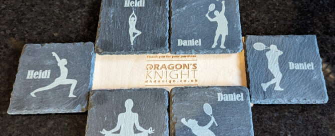 6 laser engraved slate coasters. Three of them have various female yoga positions and the other three have a male tennis player on - each in a different pose.